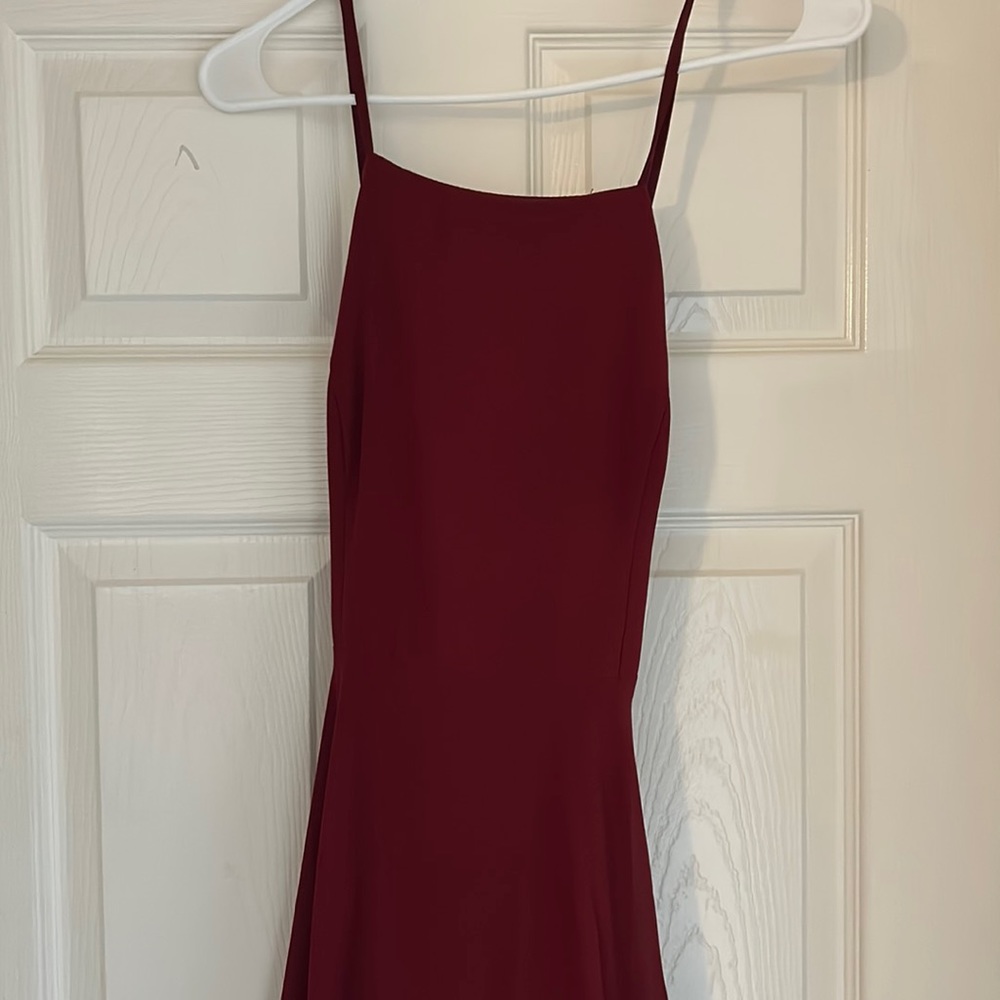 Long red bridesmaid dress. Backless